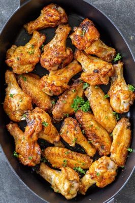 Are Baked Chicken Wings Healthy? And Why Do They Taste Like Childhood Memories?